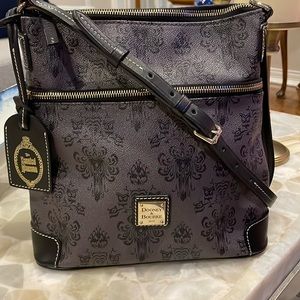 Like new Disney Haunted Mansion Disney D&B purse.  Excellent condition
